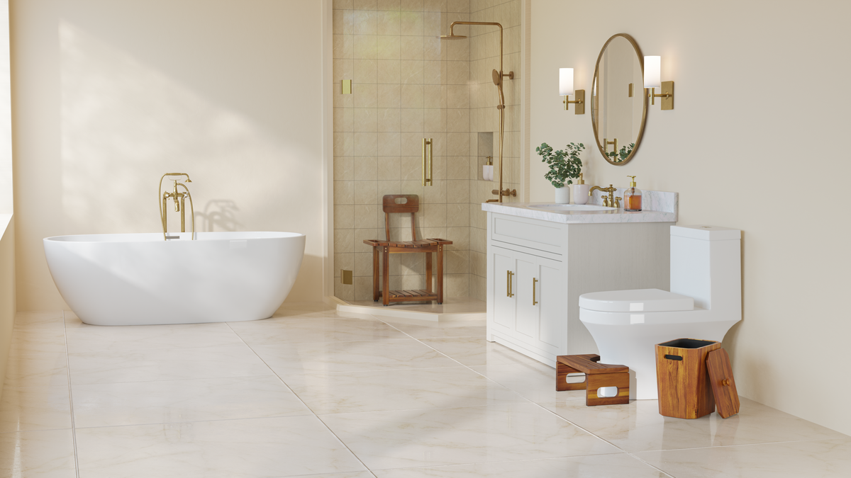 A modern bathroom scene featuring a white freestanding bathtub, a white vanity with a toilet, and warm brass fixtures, including a faucet, handles, wall sconces, and a round mirror. The room has light beige tiled floors and walls, with a glass shower enclosure in the background.