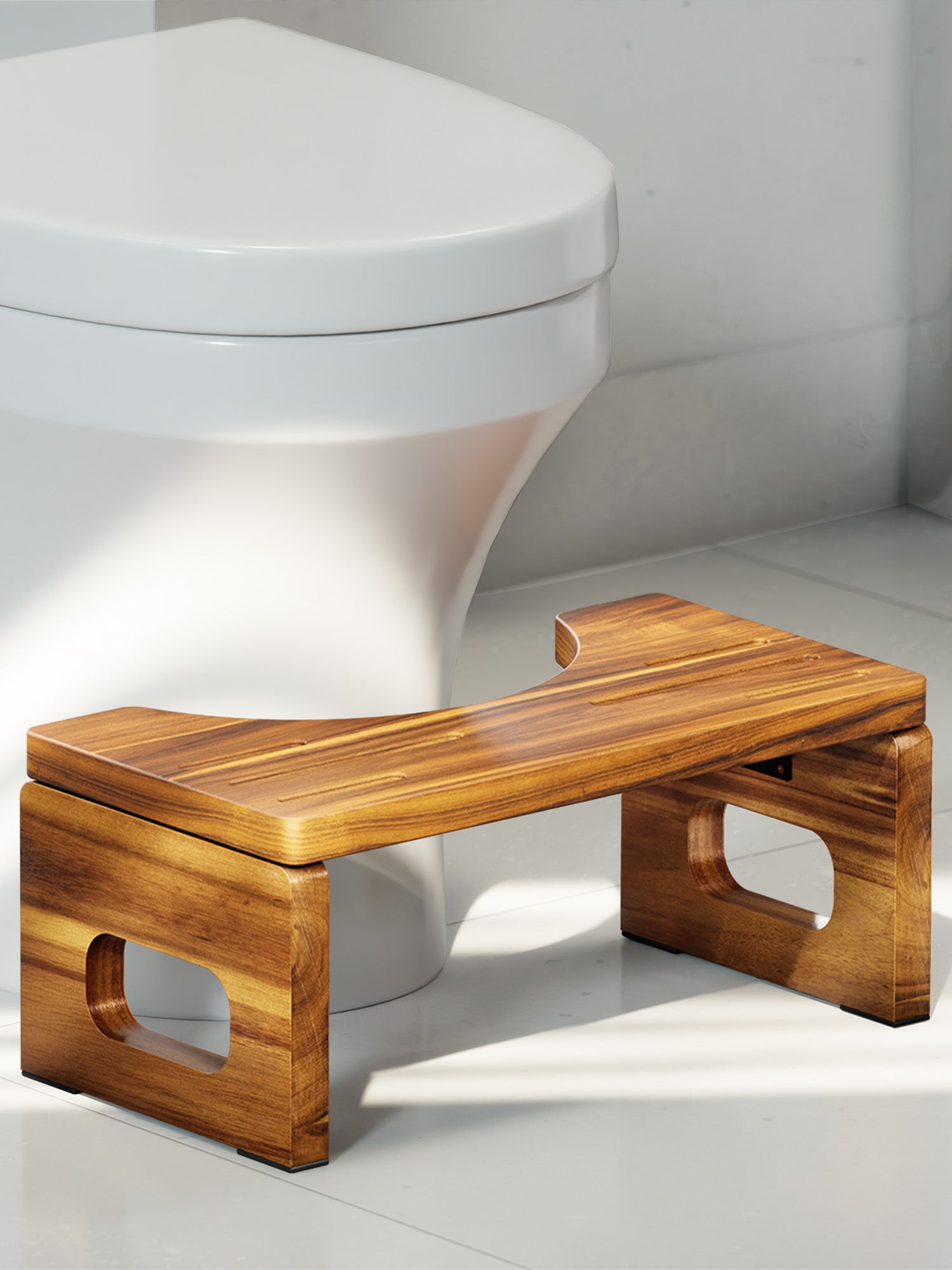 Wooden stool in front of a white toilet in a bathroom setting