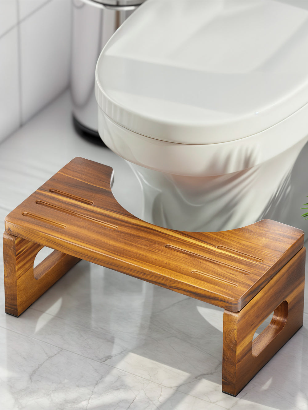 Wooden step stool in front of a toilet in a bathroom setting