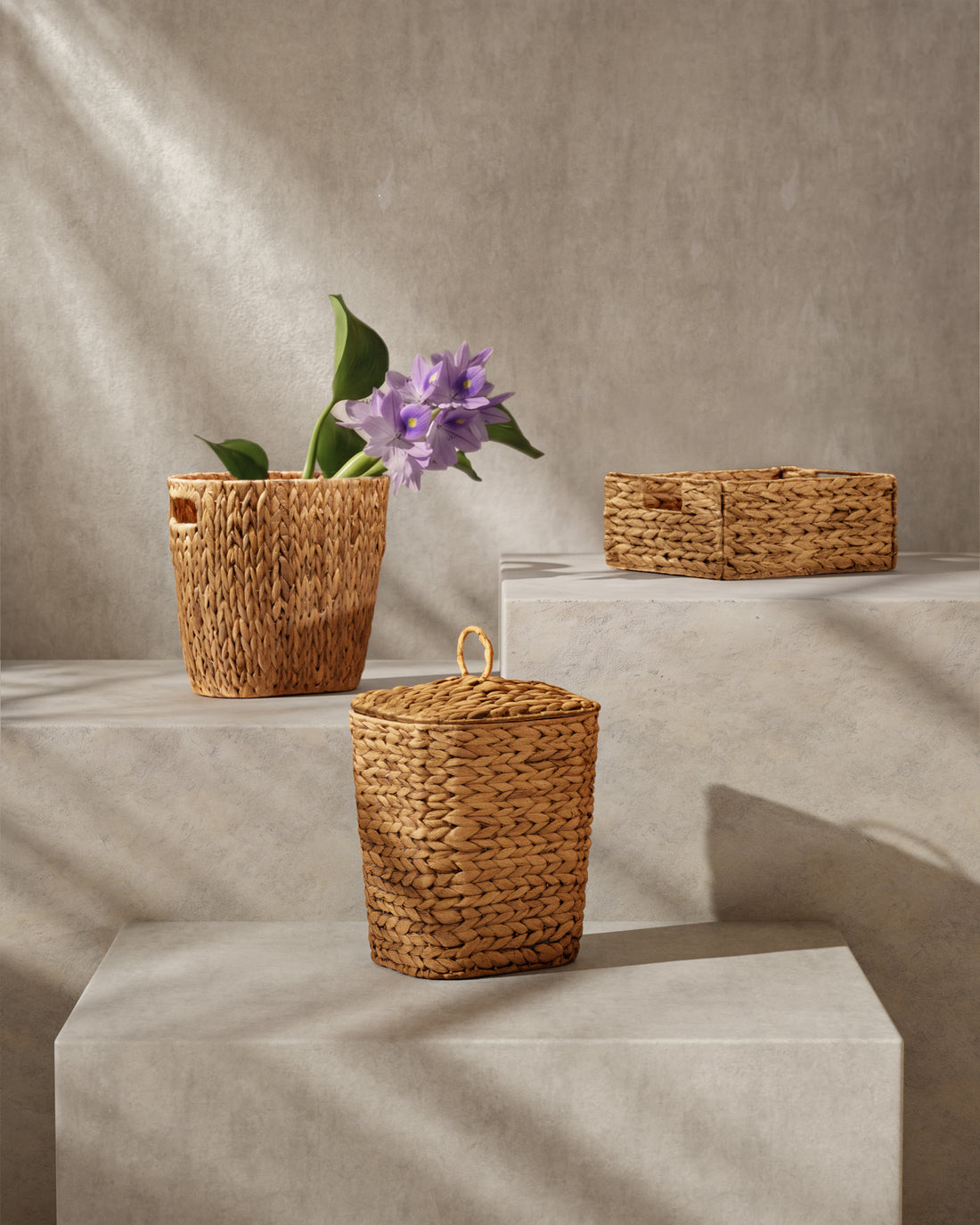 Woven baskets with a lid and without lid on a neutral background