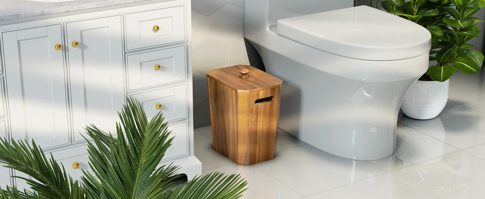 Bathroom setting with a toilet, wooden trash can, and white cabinets.
